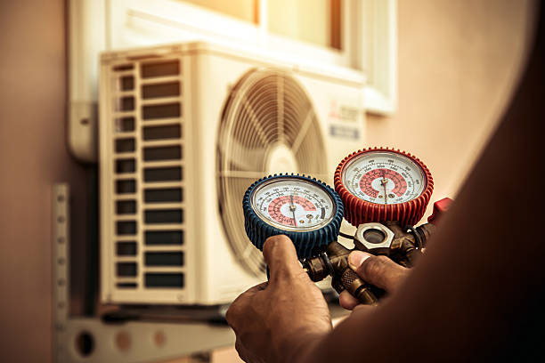 Professional Hvac Maintenance technician working in Sloan, NV